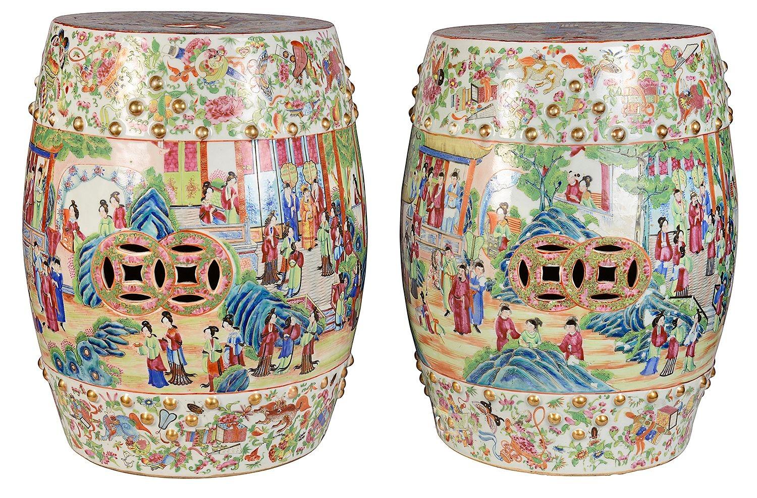 A wonderful quality pair of 19th Century Chinese Rose medallion / Cantonese porcelain garden seats. Each with beautiful bold classical green and pink colouring. Depicting scenes of various male and female couriers roaming around the gardens of a