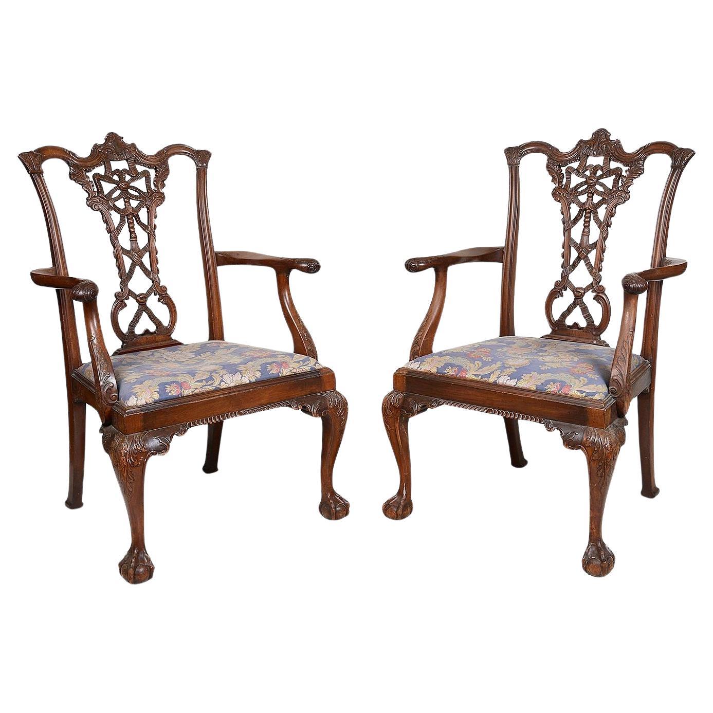Pair 19th Century Chippendale style ribbon back arm chairs For Sale