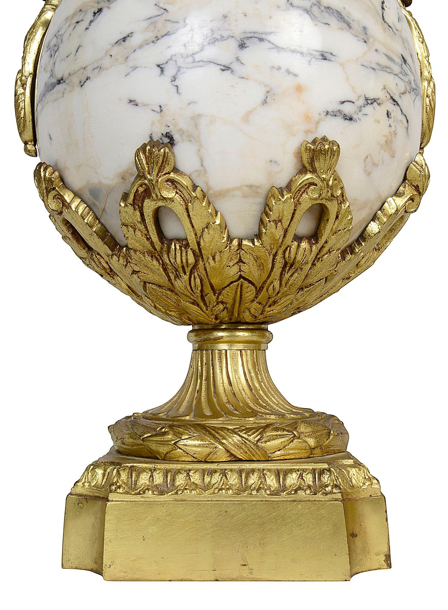 Ormolu Pair 19th Century Classical marble and ormolu urns. For Sale