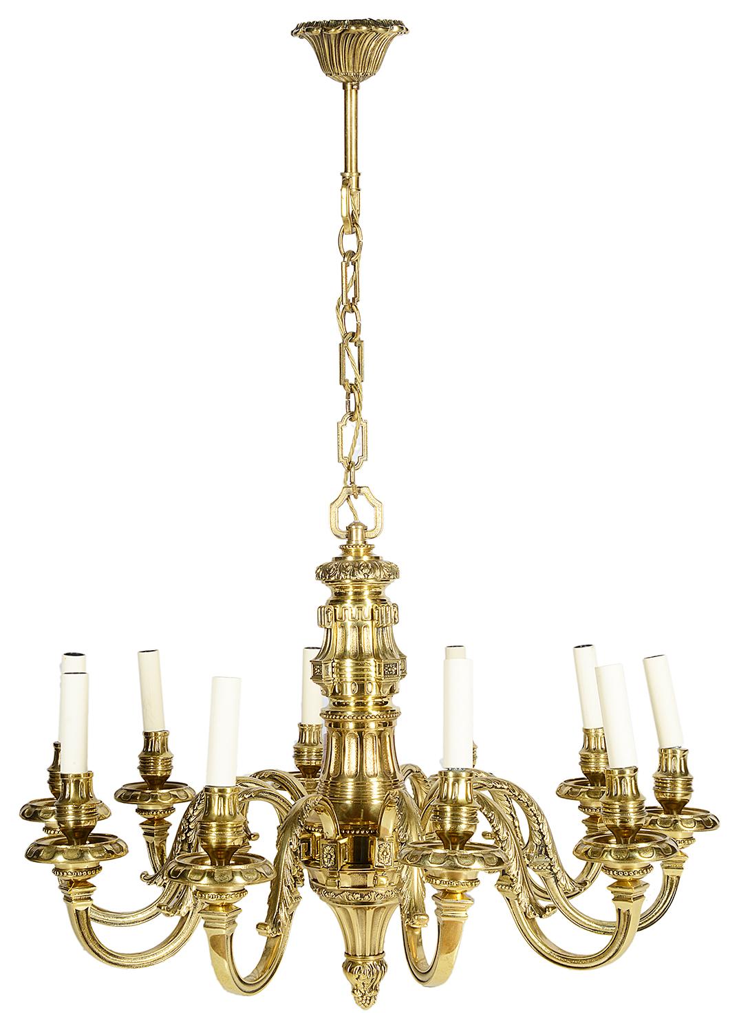 A good quality pair of 19th century classical ormolu chandeliers, each having 10 branches, with scrolling foliate and motif decoration.
Wired for electricity.