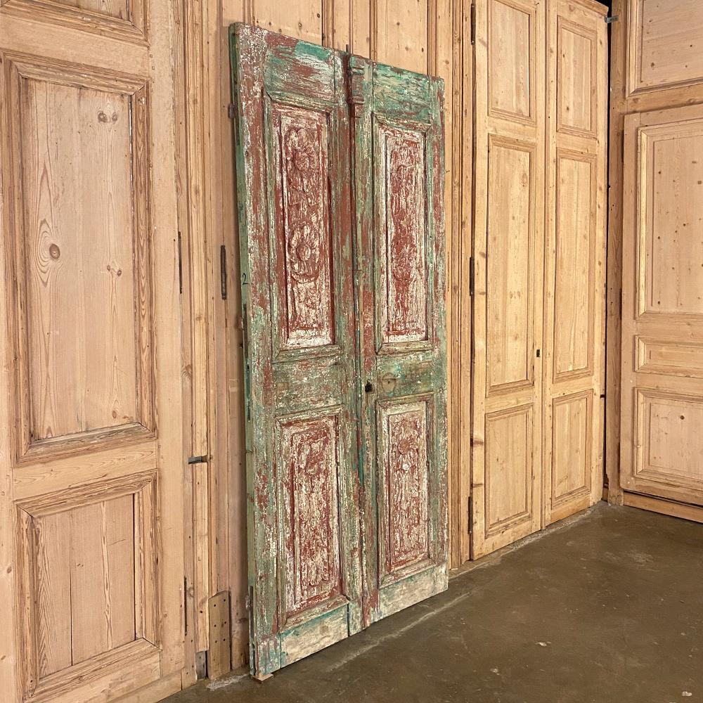 Pair of 19th century Country French painted doors will make a delightful entryway or passageway and can even be used to create visual interest just placed on a blank wall! Handcrafted using centuries-old techniques, each features raised and recessed