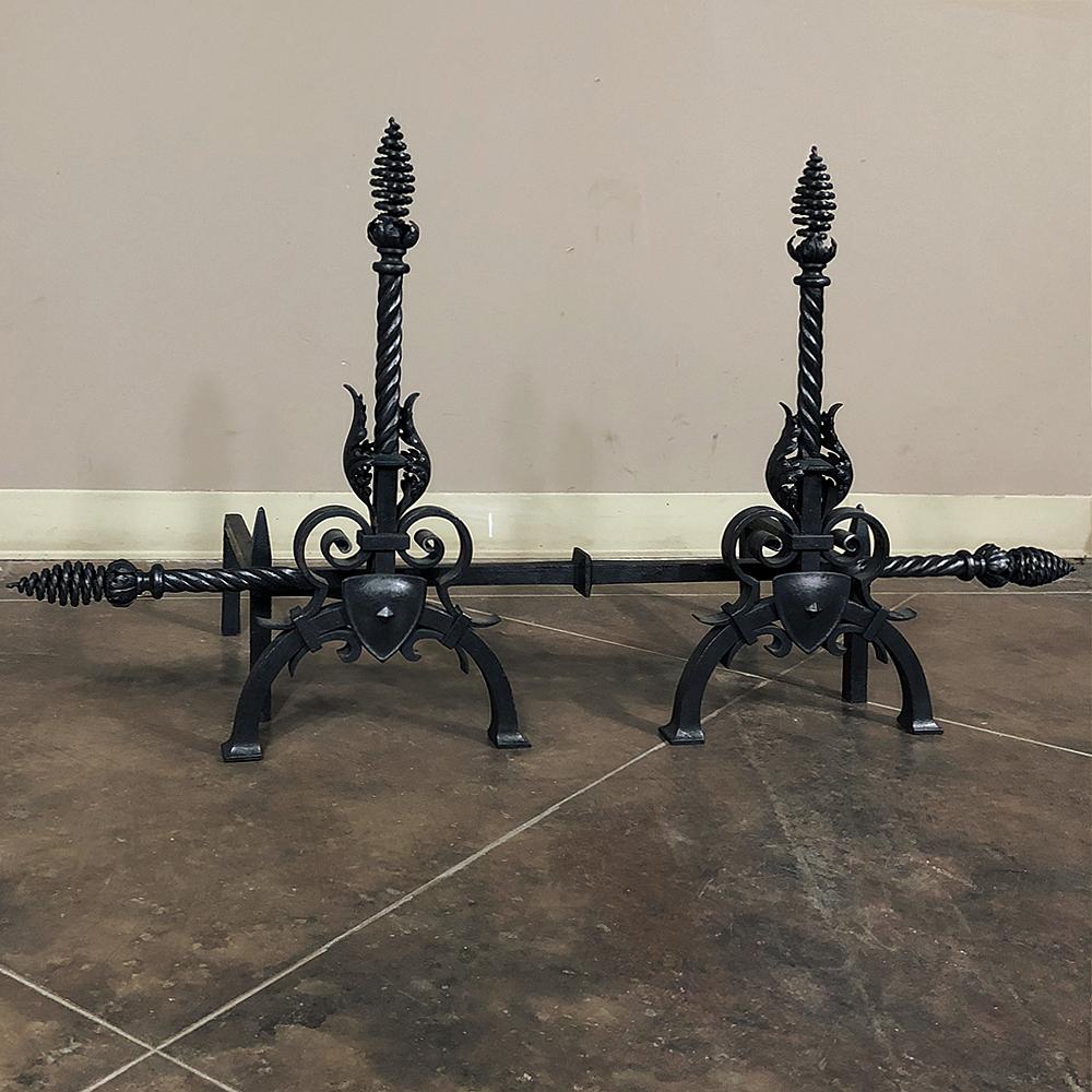 Pair 19th century Country French wrought Iron Andirons display the obvious talents of the metalsmith who created the set, which includes the connecting bar that has intricate spiraled finial embellishments to match the spiral andirons and finials,