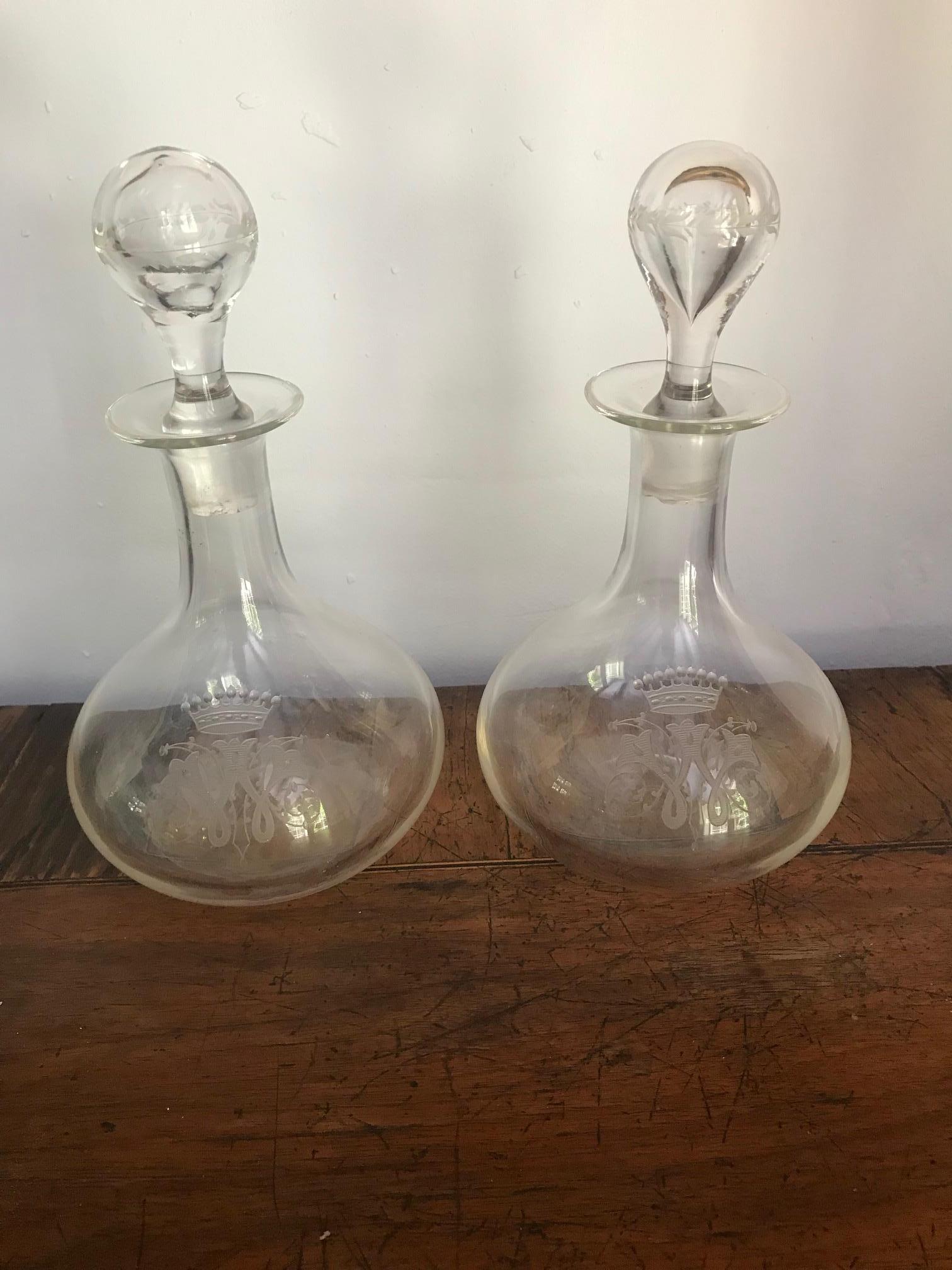 An exquisite pair of 19th century French crystal decanters engraved with monogram and coronet. Unsigned but of Baccarat quality.