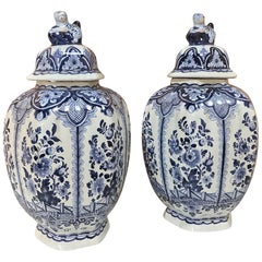 Pair of 19th Century Delft Blue and White Lidded Vases