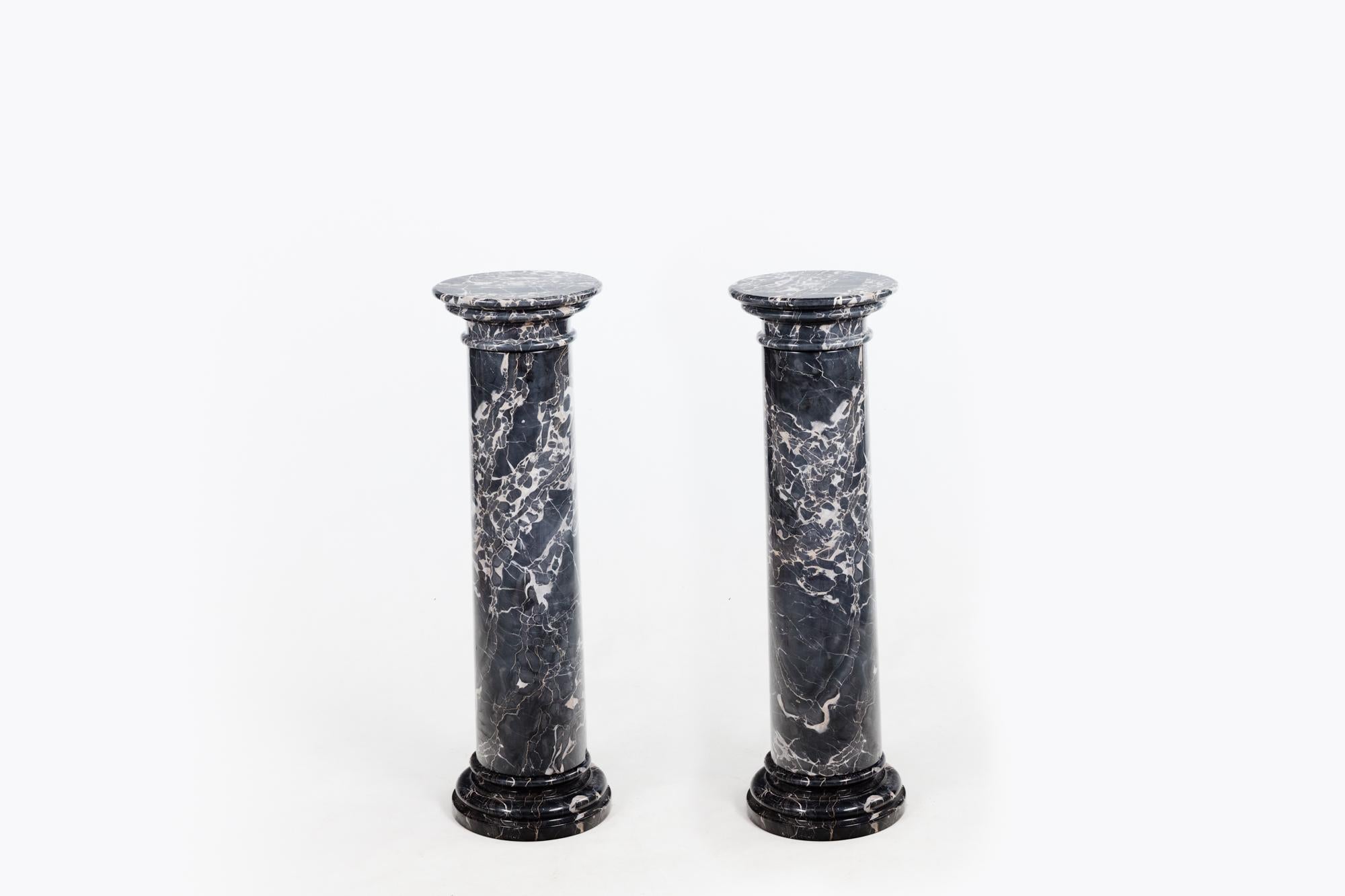 Pair 19th Century dove grey marble column pedestals, of good proportions, with stepped circular bases.