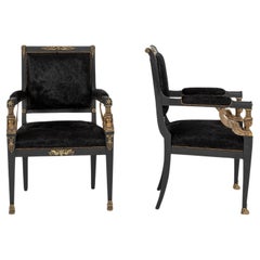 Coppia di poltrone in cuoio nero stile impero ebanizzato del XIX secolo