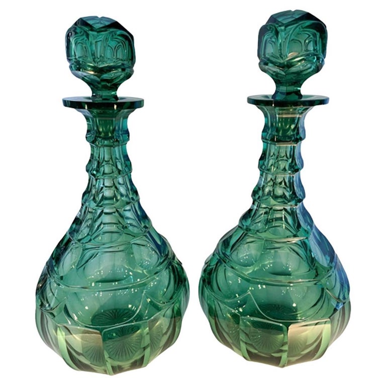 Pair 19th Century Elaborately Cut Emerald Green AngloIrish Decanters