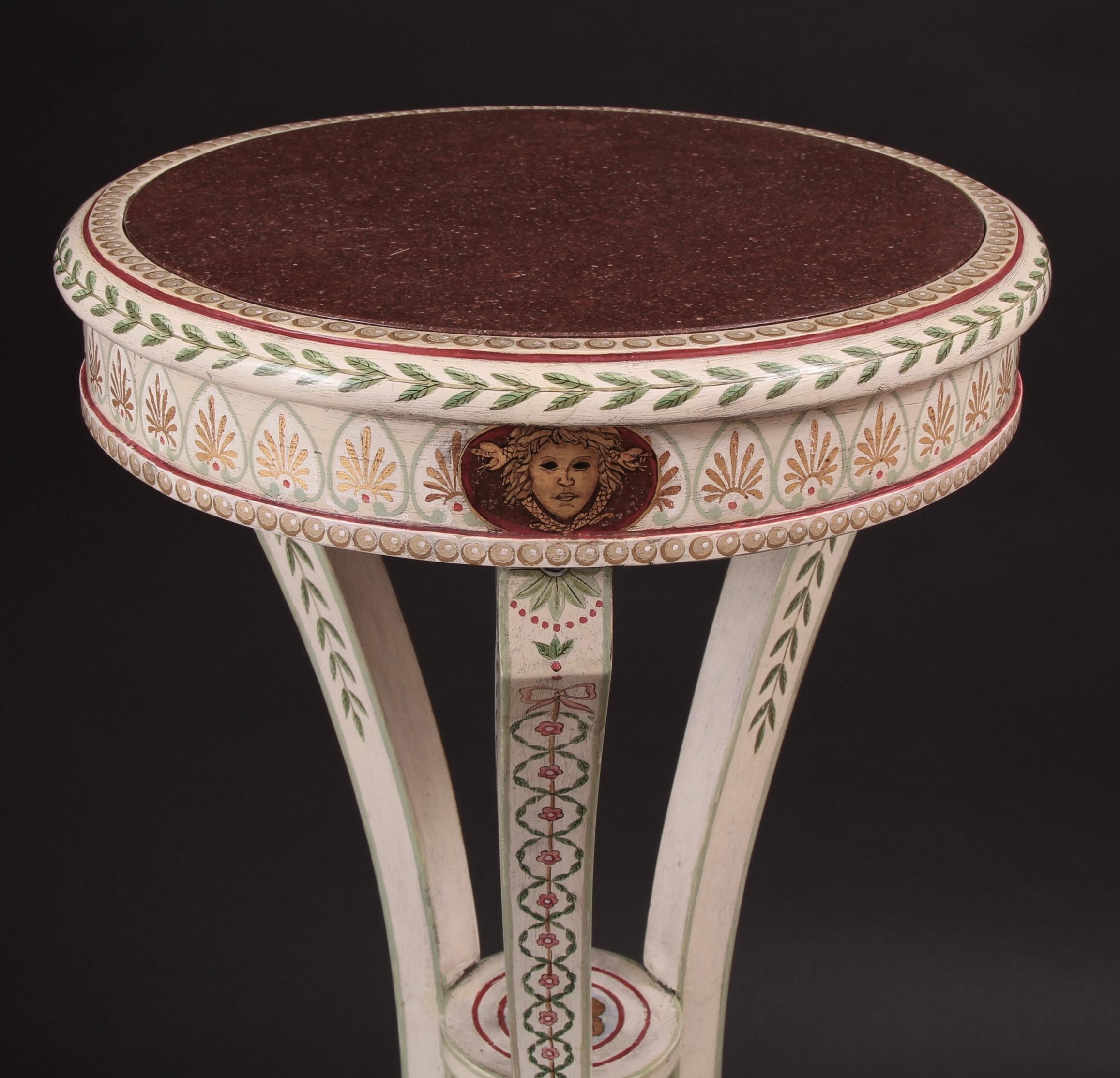 Fine pair of 19th century Etruscan neoclassical painted parcel-gilt pedestals in the manner of Robert Adam. This refined pair incorporate the most exceptional & beautiful neoclassical design throughout. The circular top is inset with the rare stone