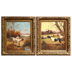 Paire de peintures à l'huile représentant des chiens de chasse européens du XIXe siècle, dans des cadres en bois doré