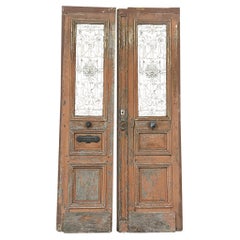 Coppia di porte francesi da esterno del XIX secolo con ferro battuto