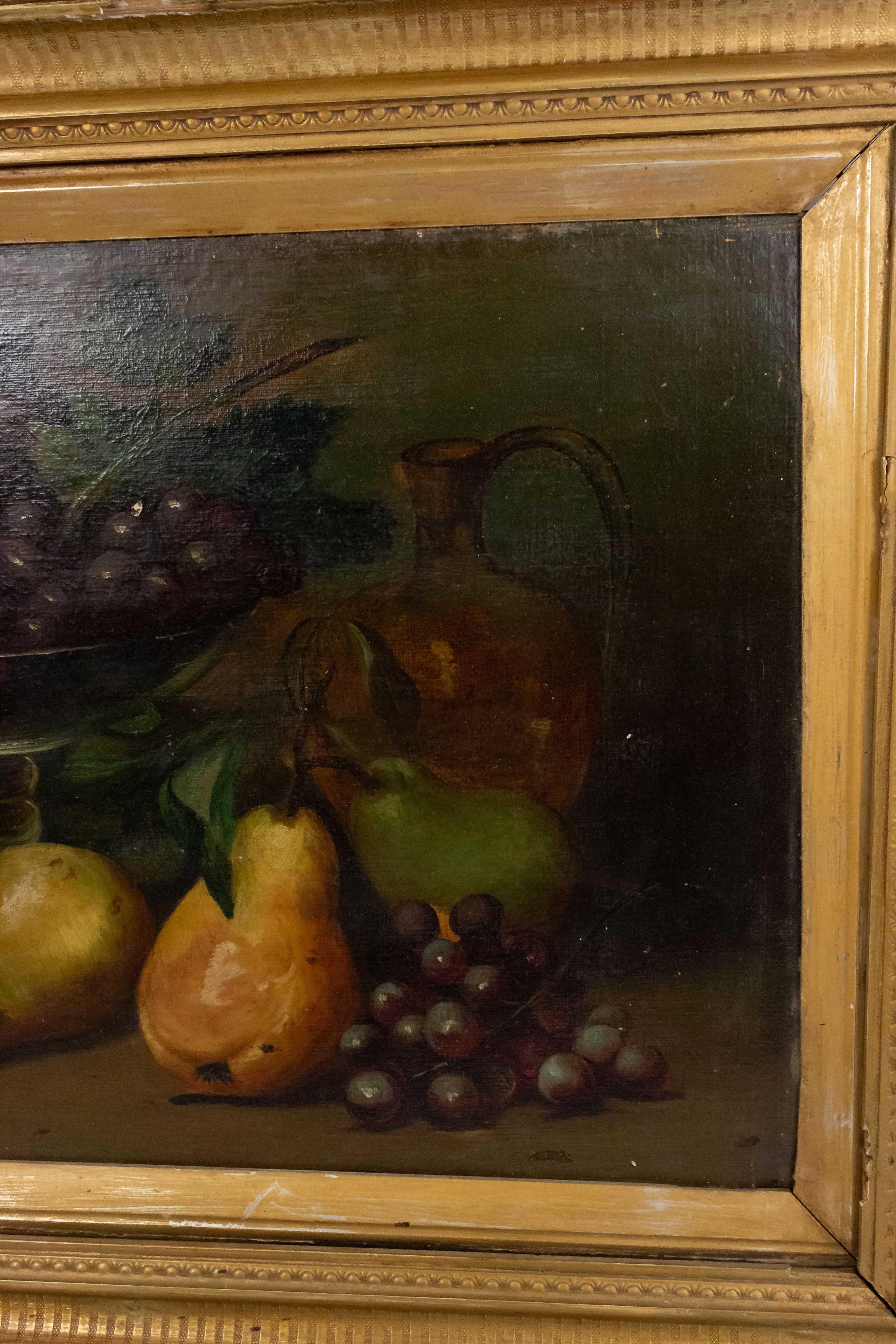 Paire de natures mortes à l'huile du 19ème siècle, encadrées et dorées, représentant des paysages de table avec des fruits.
 