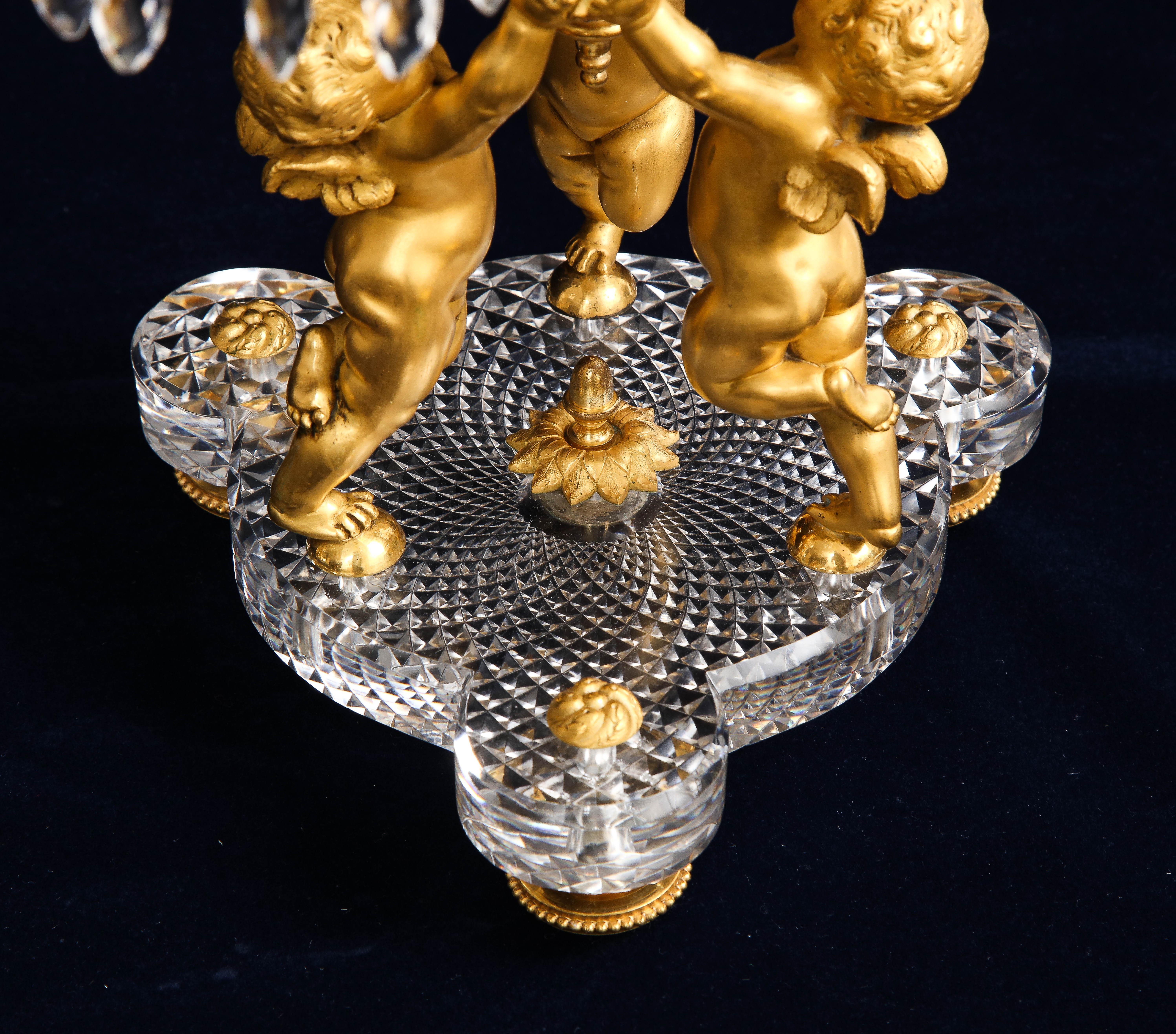 Paire de candélabres français du 19ème siècle à 7 bras en bronze doré et cristal signés Baccarat 3