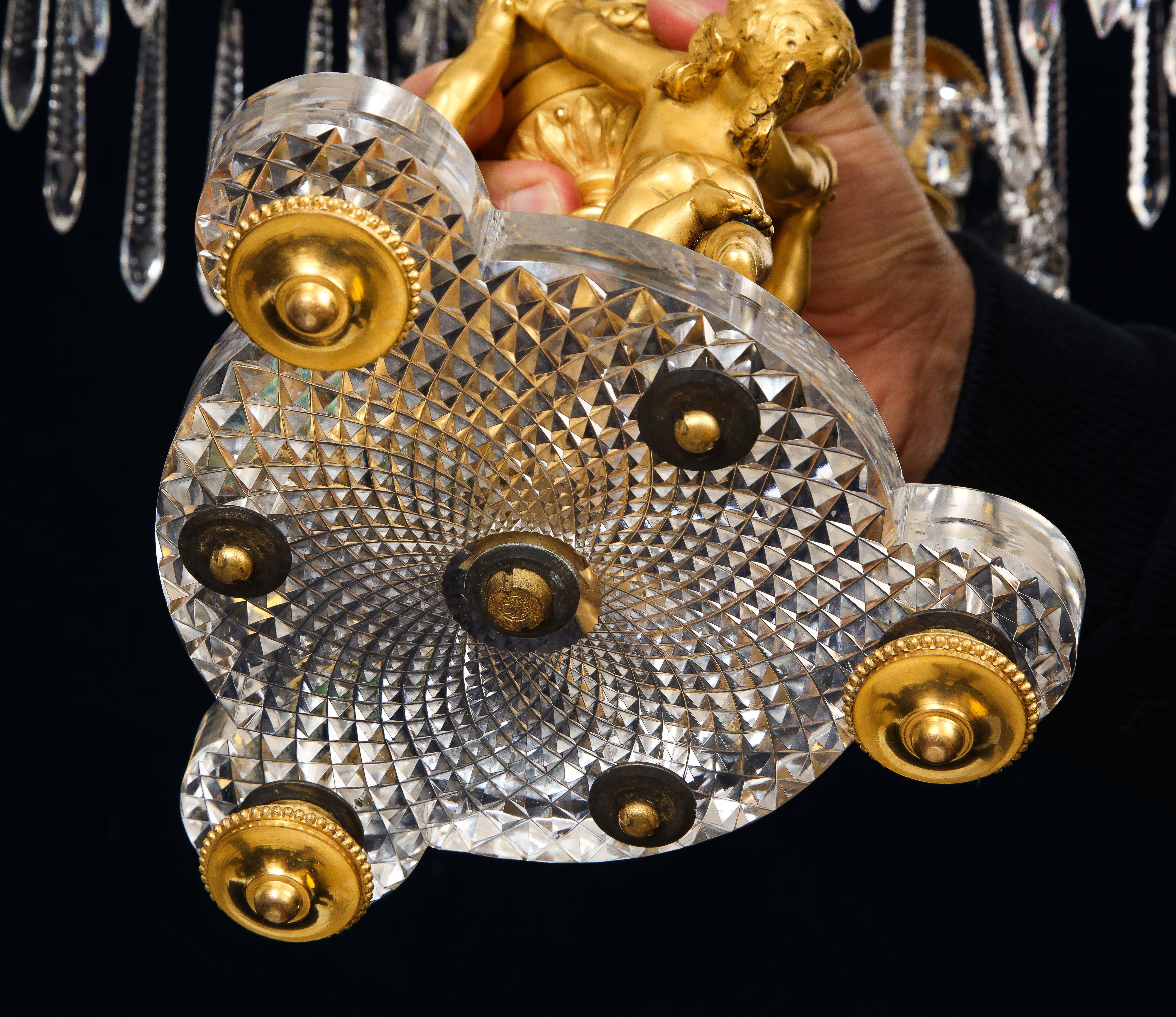 Paire de candélabres français du 19ème siècle à 7 bras en bronze doré et cristal signés Baccarat 4