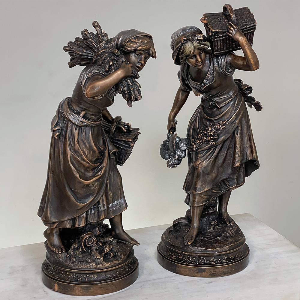 Pair 19th Century French bronze statues by Louis Auguste Moreau (1855-1919) are exemplary examples of the glorification of the simple rural life celebrated by artists in France during the Belle Epoque. A distinctive departure from rendering affluent