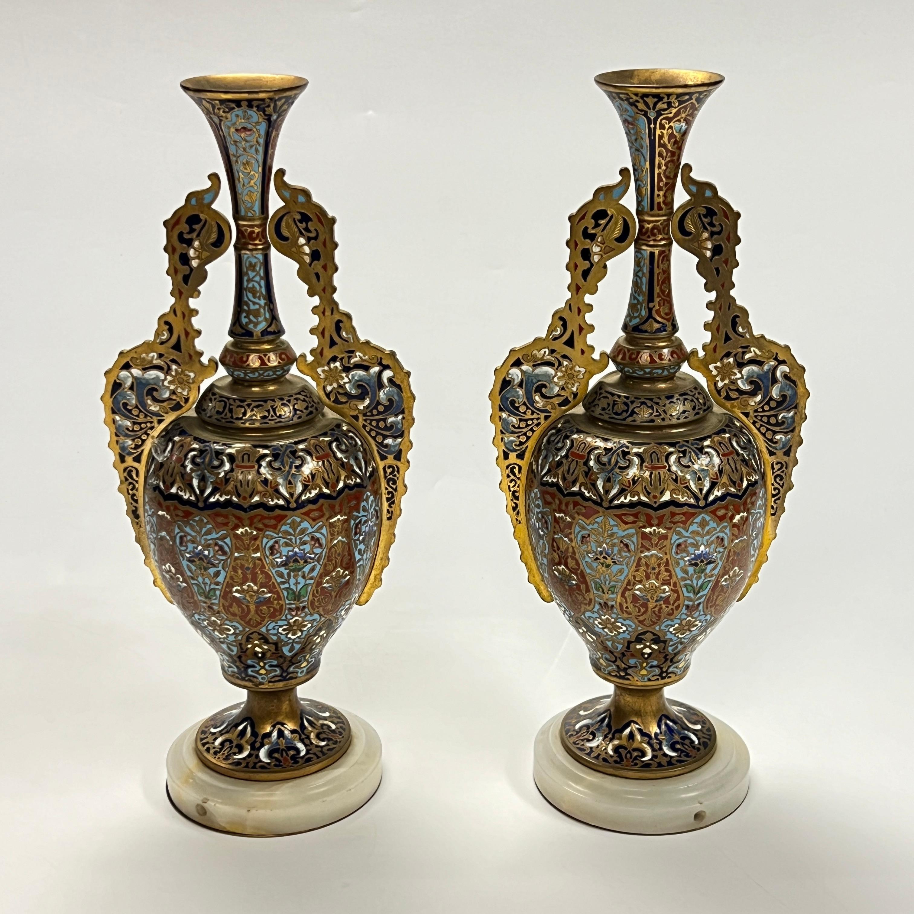 Pair of antique (late 19th century) French Alhambra vases in champleve enamel inlaid bronze with onyx bases. 