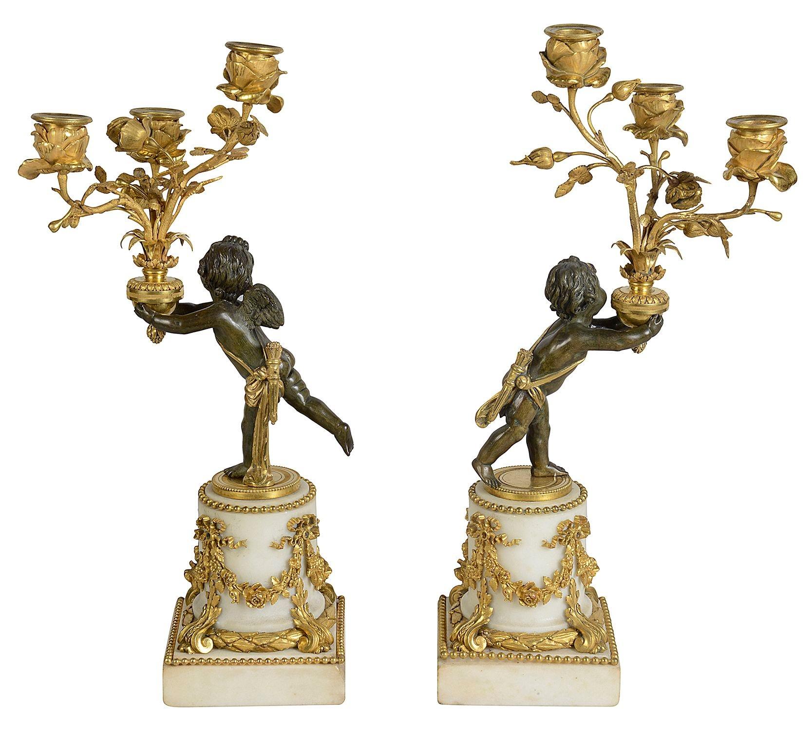 Bronzo Coppia di candelabri francesi a cherubino del XIX secolo in vendita