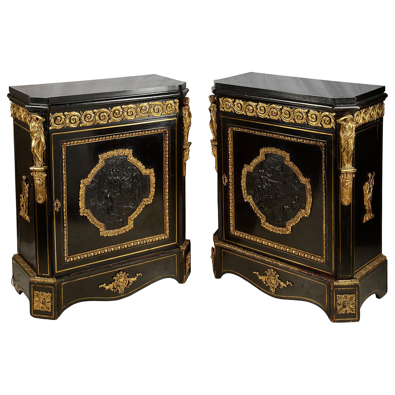 A pair of 19th Century French Ebonised Pier / Side Cabinets For Sale