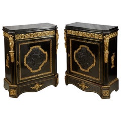 A pair of 19th Century French Ebonised Pier / Side Cabinets