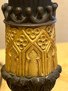 Paire de candélabres Empire français du 19ème siècle en bronze patiné et doré.