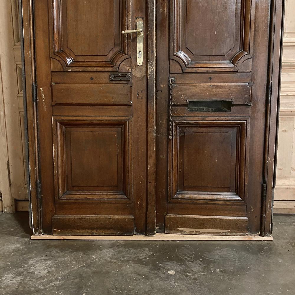 Hand-Crafted Pair of 19th Century French Exterior Doors in Frame