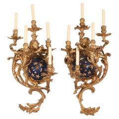 Paire d'appliques à cinq lumières françaises du 19ème siècle en bronze doré et émail bleu