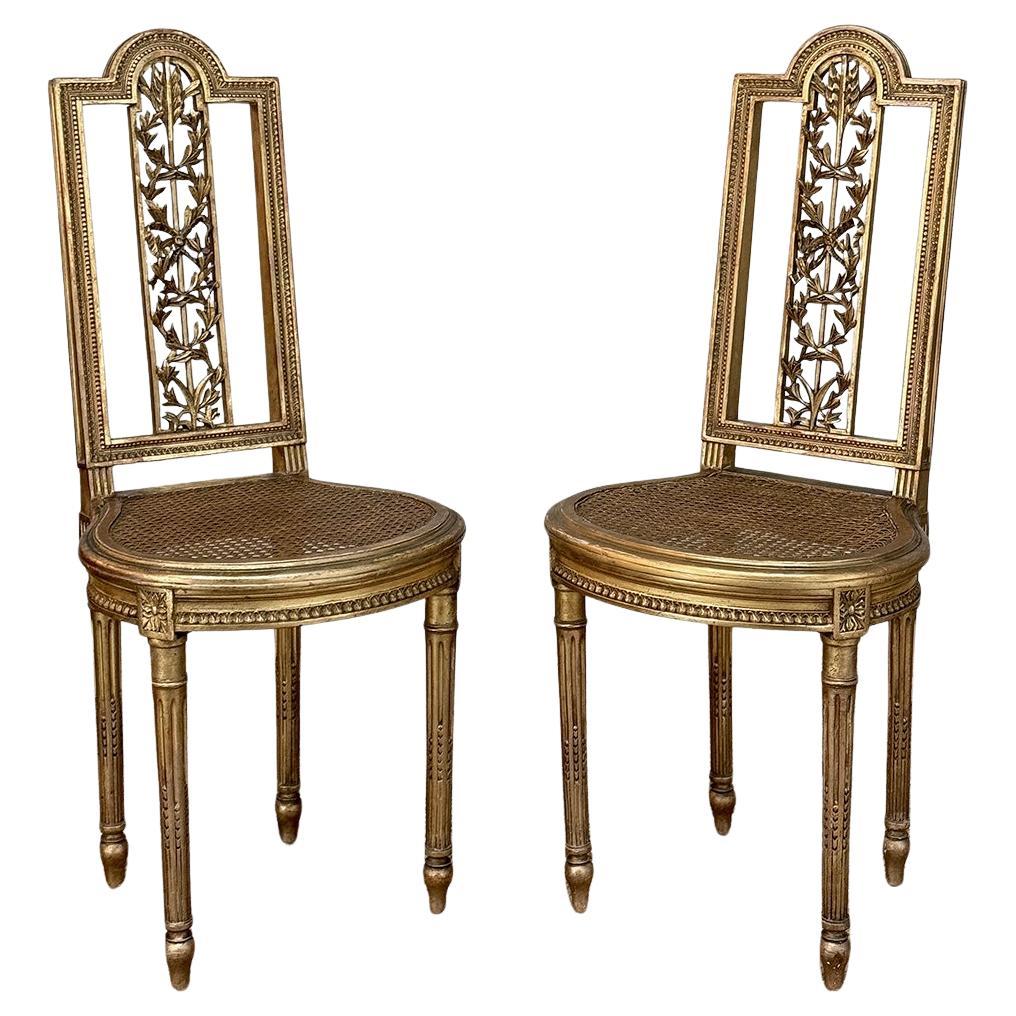 Pair 19th Century French Giltwood Louis XVI Salon Chairs with Cane Seats