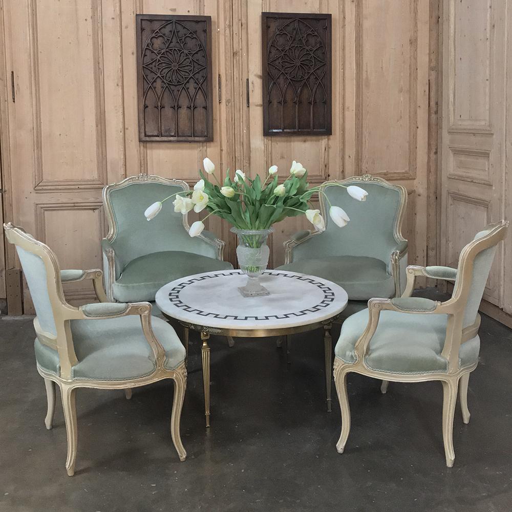 Pair of 19th century French Louis XV Bergeres, armchairs are a study in elegance and grace, featuring wraparound seatbacks that cradle you in comfort, especially in combination with the generous sized seat. Upholstered in a subtle green mohair, each
