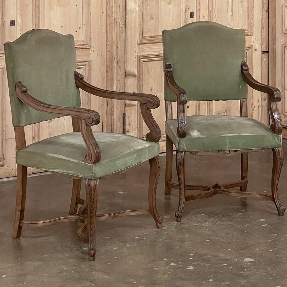 Pair 19th century French Louis XV Walnut Armchairs ~ Fauteuils are a great choice for a comfortable seating group while providing subtle style and timeless design! handcrafted from solid walnut, each features a medium-height arched seatback.