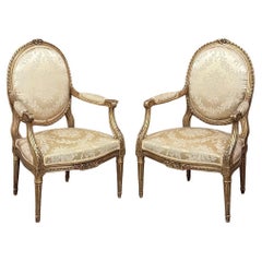 Paire de fauteuils en bois doré Louis XVI du 19ème siècle ~ Fauteuils