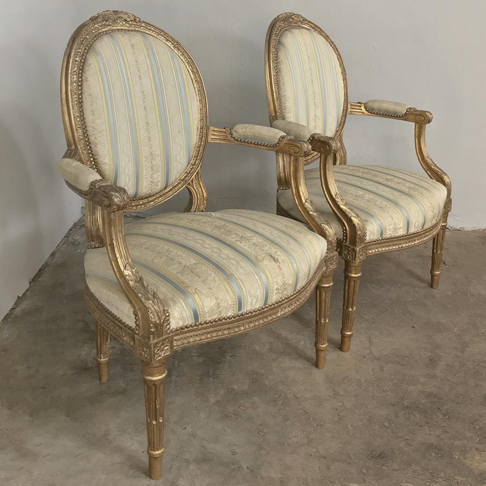 Hand-Carved Pair of 19th Century French Louis XVI Giltwood Armchairs For Sale