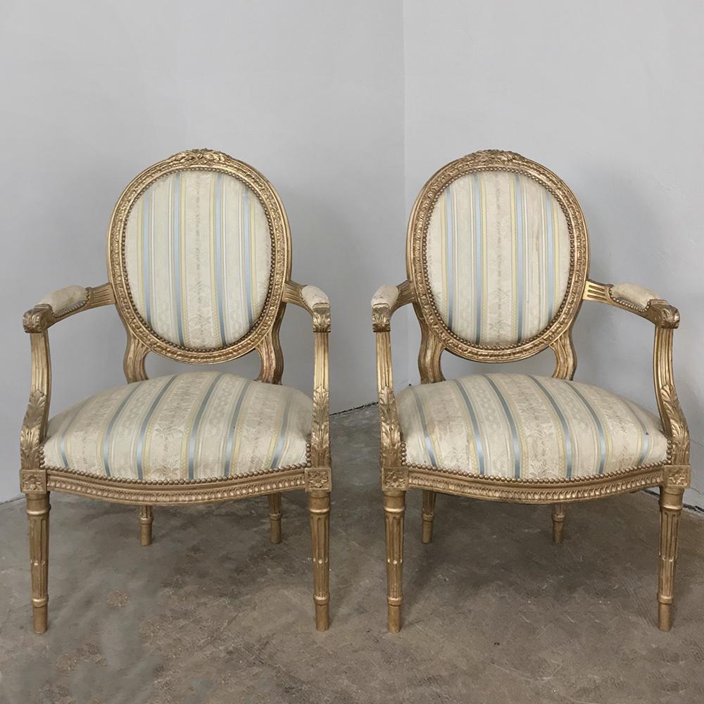 Hand-Carved Pair of 19th Century French Louis XVI Giltwood Armchairs For Sale