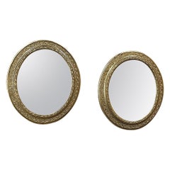 Pair of 19th Century French Louis XVI Oval Gilded Mirrors