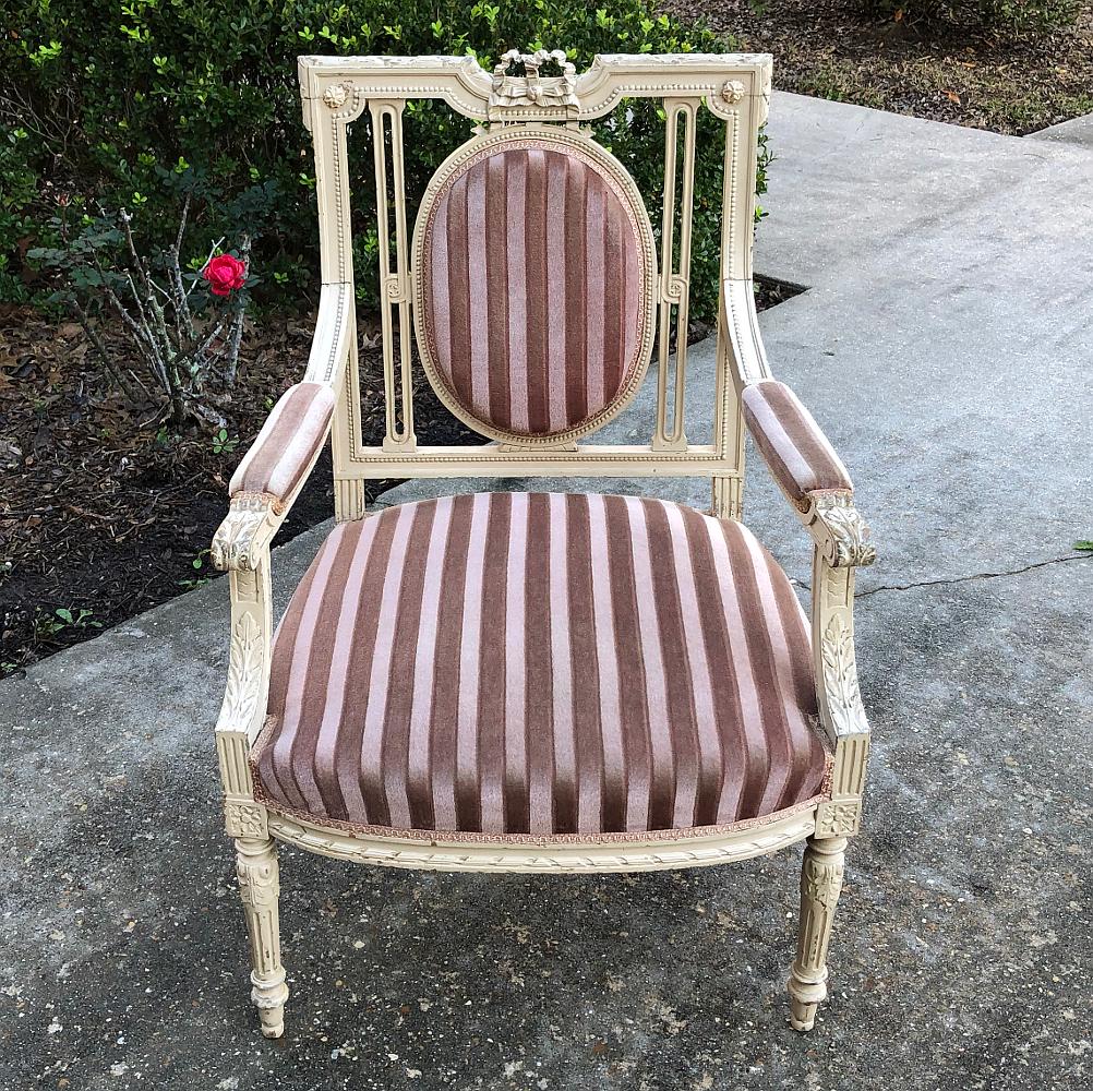 This pair of 19th century French neoclassical painted armchairs is perfect for adding a Classic touch with a light, airy look. Rectilinear architecture is easy to blend with most any decor. The open frame design creates a lightweight design that