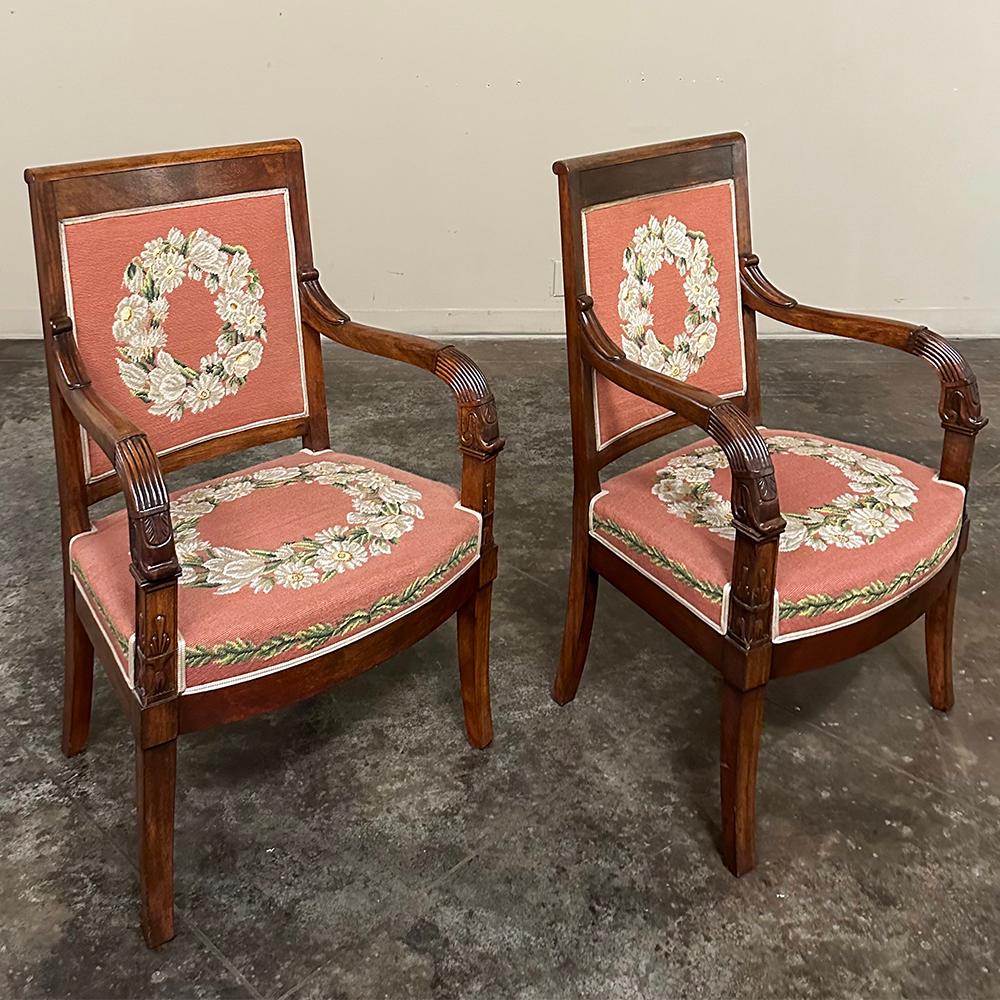 PAIR 19th Century French Mahogany Empire Armchairs with Needlepoint Tapestry were literally designed to last for centuries!  Hand-crafted from highly revered exotic imported mahogany from the Americas, the frameworks were adorned with a modicum of