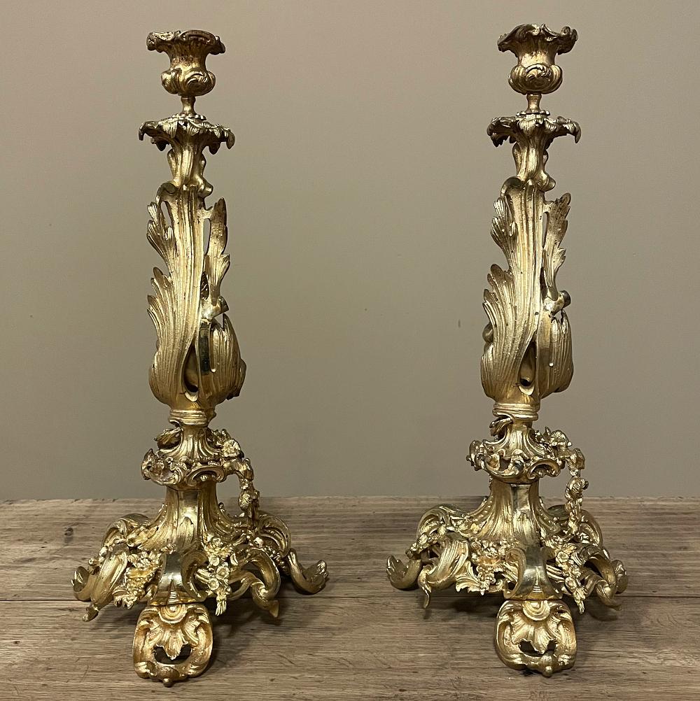 Pair 19th century French Napoleon III Period Bronze D'Or Rococo Candlesticks are a stunning work of the sculptor's art rendered in ormolu to literally last for centuries! The elaborately naturalistic form of the Rococo movement has been captured, a