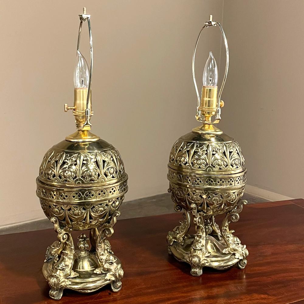 Pair 19th century French Napoleon III Period oil lanterns converted to table lamps will make the perfect finishing touch to any room! Nothing adds ambiance like antique lighting, and this pair are exceptional. Cast in bronze, the design features an