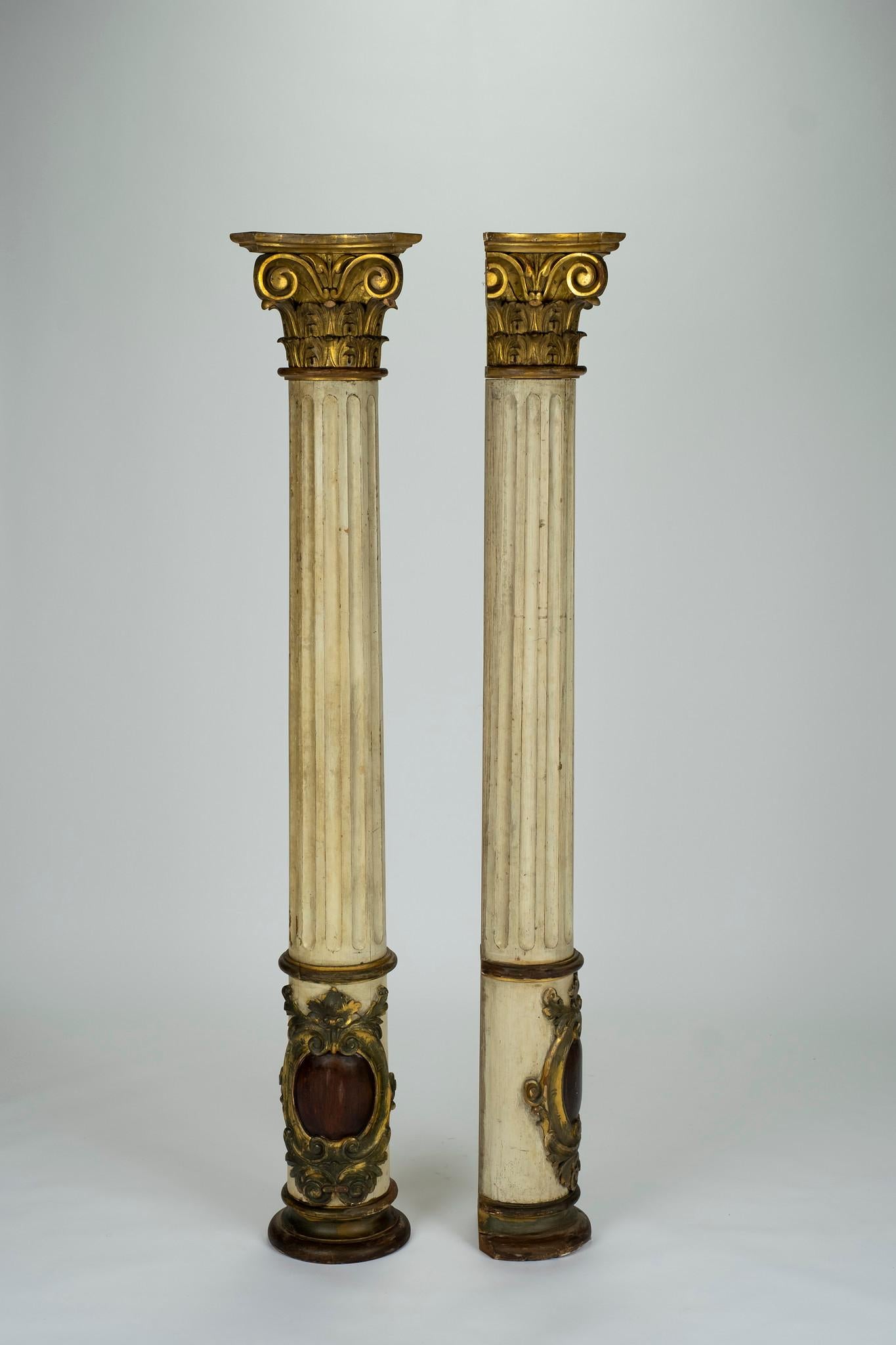 Pair of 19th century French columns. Paint and gilded oak hardwoods with Ionic capitals, fluting and classical detailing.
 
  