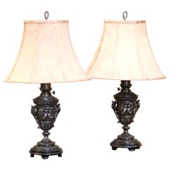 Pair 19th Century French Polished Spelter Urn Table Lamps with Cherubs