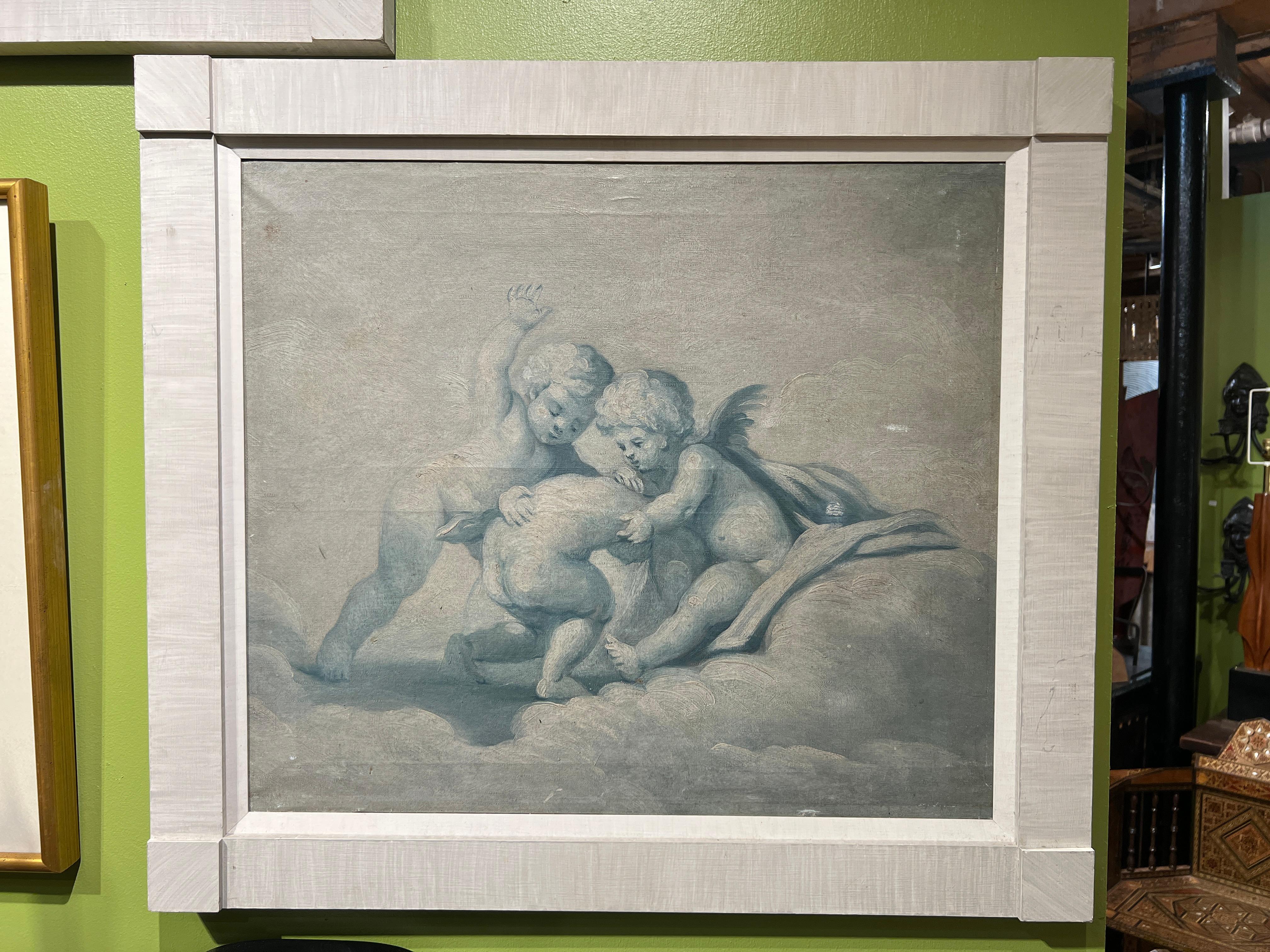 This exquisite pair of 19th-century French paintings captures playful putti, or cherubic children, rendered in a Baroque-inspired style. These charming artworks, executed in delicate shades of blue and white, showcase a classic Rococo flair,
