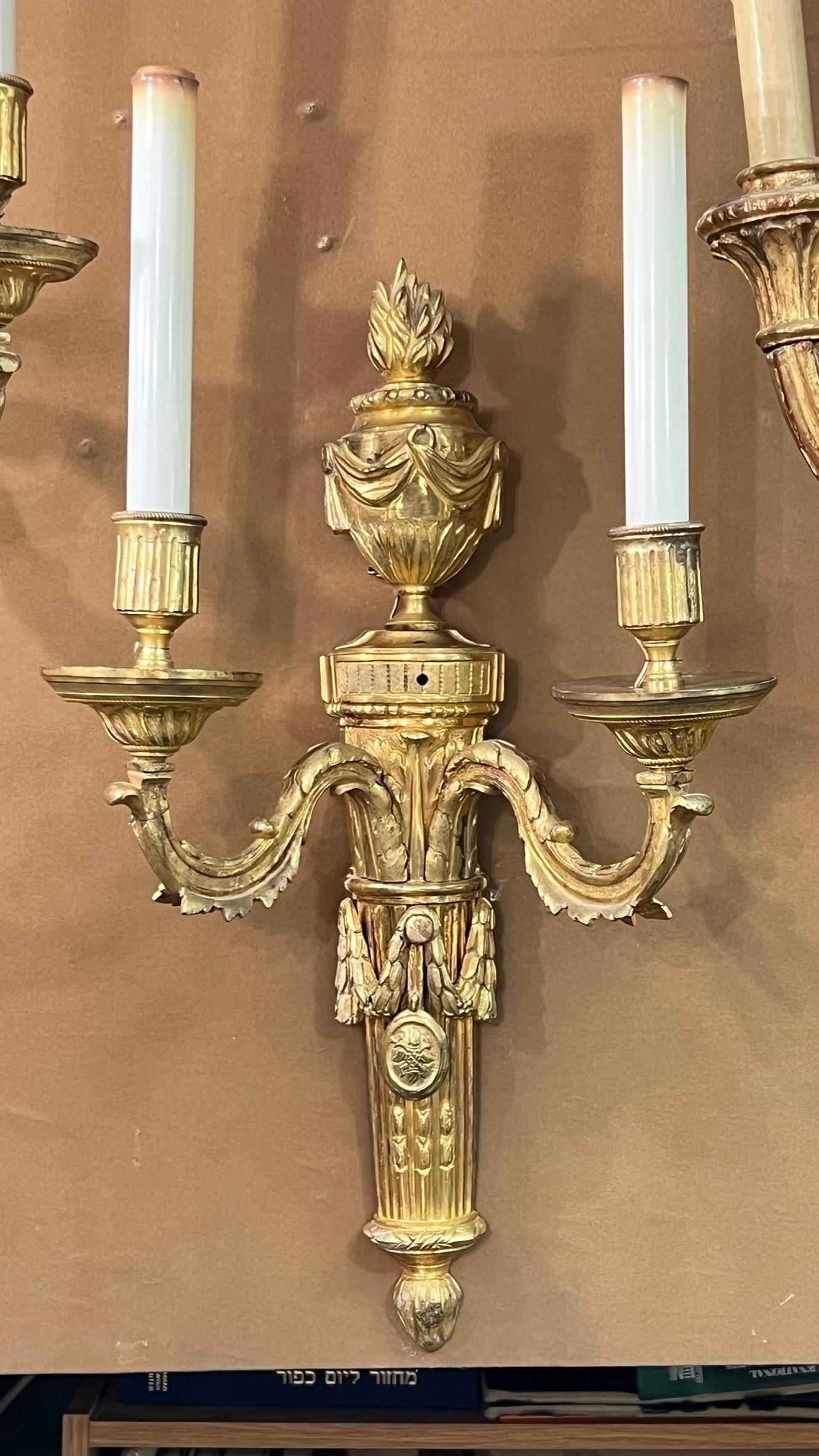 Gilt Pair 19th Century French Torch Form Two-Light Sconces in Louis XVI Style For Sale