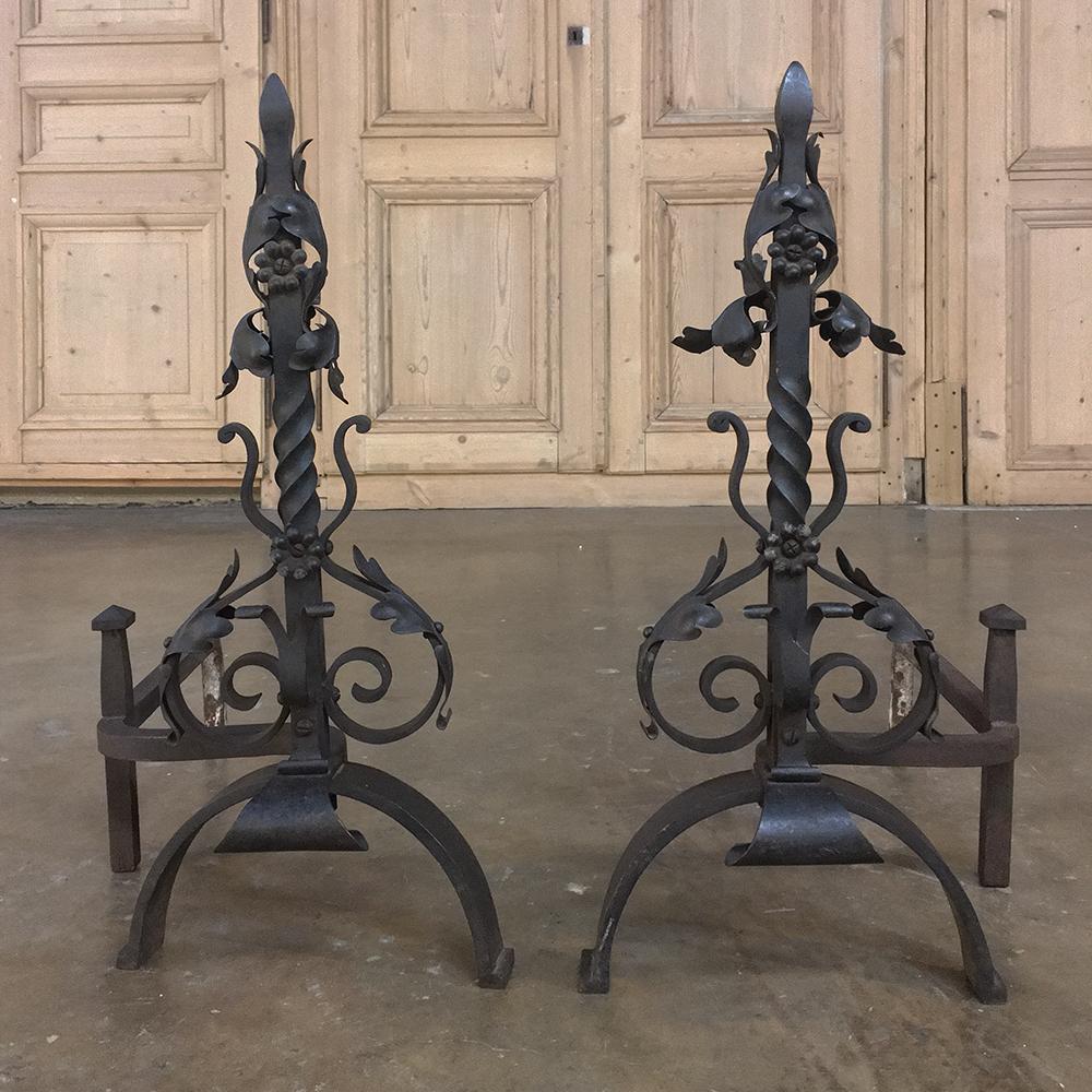 Pair 19th century wrought iron andirons feature exceptional style and flair, with acanthus leaves, florets, scrollwork and twisted rod shafts. Designed for centuries of enjoyment!
circa 1850s
Each measures: 22H x 13W x 22D.