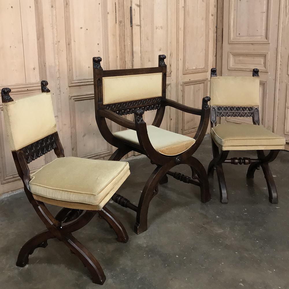 Pair 19th century Gothic chairs features architecture that dates back to ancient Greece and Egypt, with timeless Gothic styling to create a surprisingly comfortable and versatile chair. Carved acanthus plumes appear on the tops of the seatback