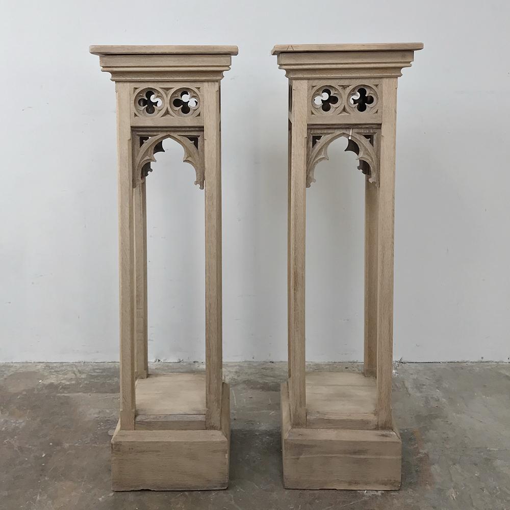 Pair of 19th century Gothic stripped oak pedestals are ideal for displaying your matched pair or coordinating objets d'art! handcrafted from solid oak and styled in the first official formal style of France, dating to the middle of the 12th century,