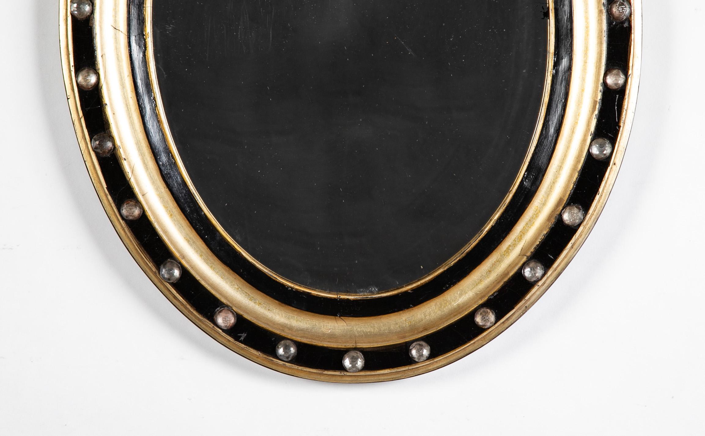 Pair 19th Century Irish Gilt and Ebonized Oval Mirrors With Faceted Crystals In Good Condition For Sale In Stamford, CT