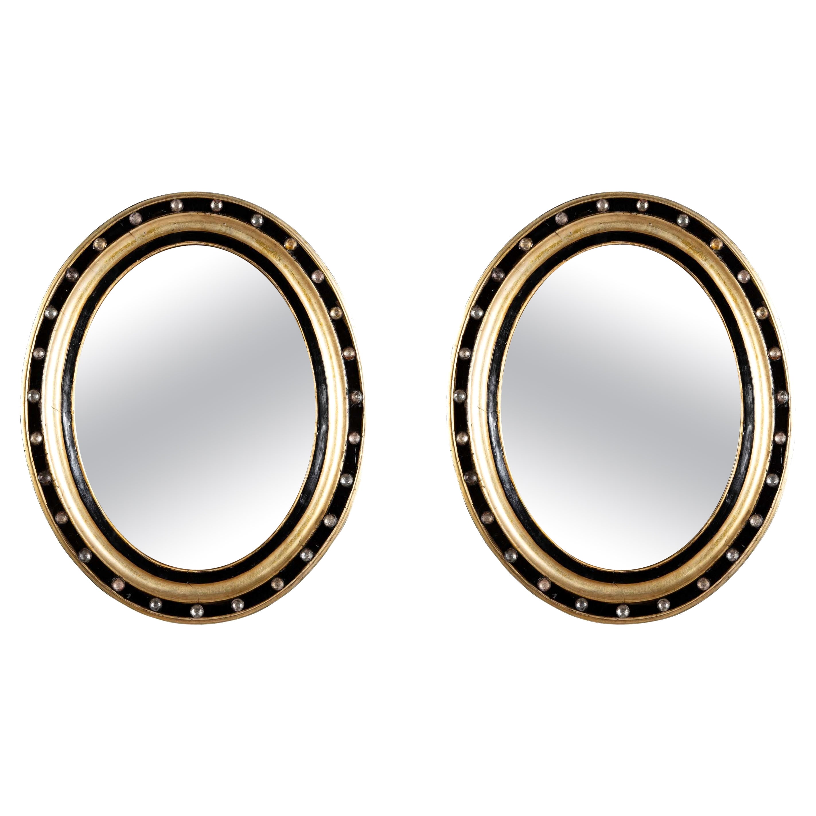 Pair 19th Century Irish Gilt and Ebonized Oval Mirrors With Faceted Crystals