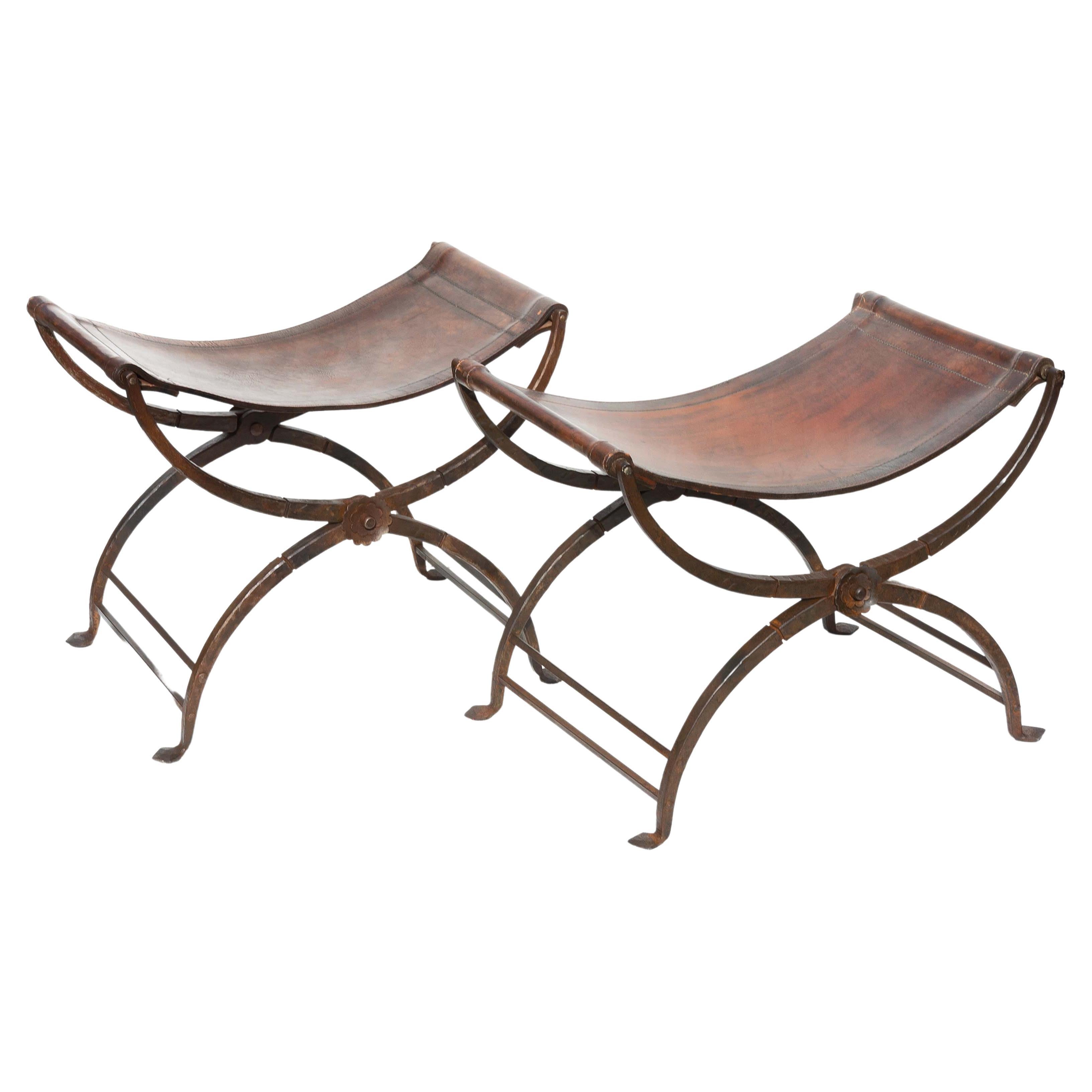 Pair 19th century Italian curule folding stools. Hand wrought iron folding base. Double stitched fine Italian leather seats. Exceptional quality.
























Renaissance.
 