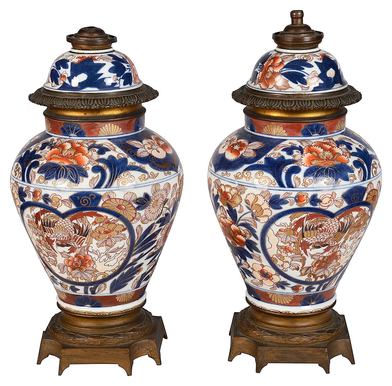 Pair of good quality 19th Century Japanese Imari lidded vases / lamps, each with gilded ormolu mounts, classical blue and orange scrolling foliate decoration, circa 1880.
Batch 73 c/c CKZN  G9927/23