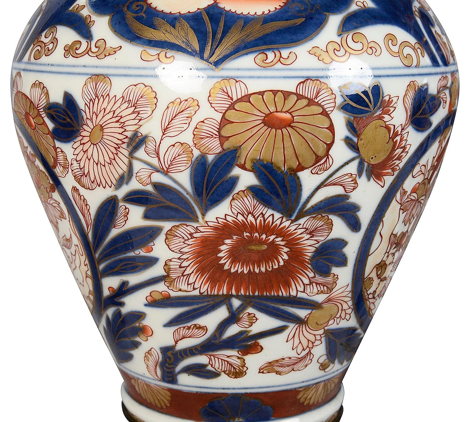 Porcelain Pair 19th Century Japanese Imari vases / lamps.