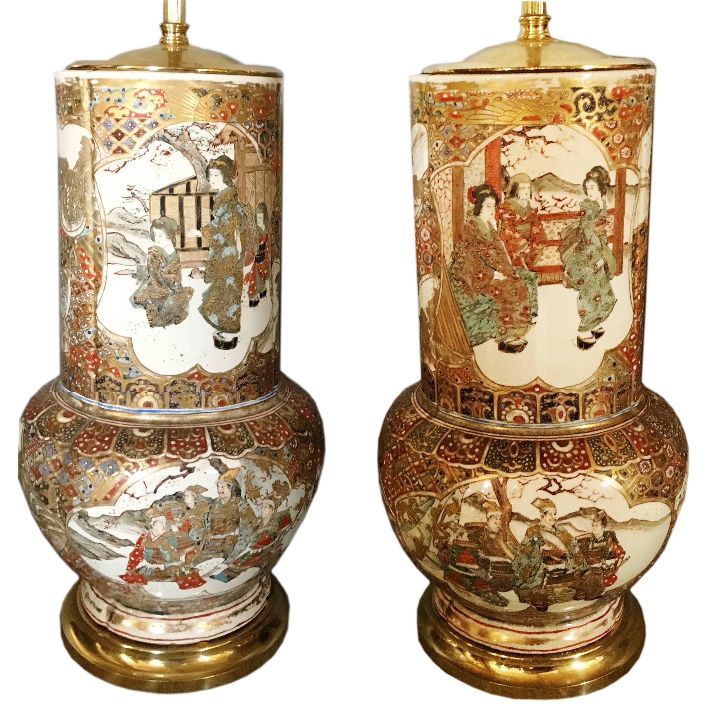 A good quality pair of 19th century Japanese Satsuma vases / lamps, each of bottle form, having the classic gilded and orange decoration to the background. With inset hand-painted scenes of oriental figures in the gardens. Having a brass top and