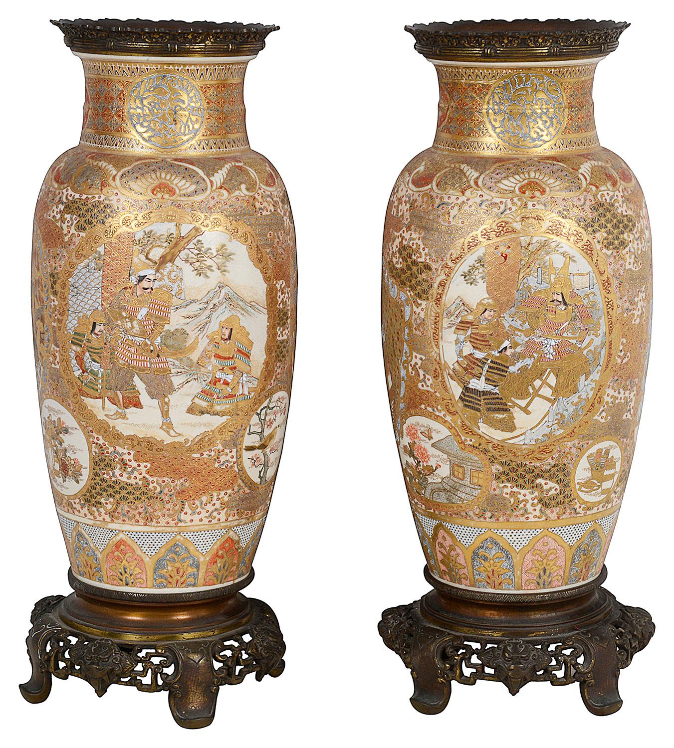 A very good quality pair of Japanese Meiji period (1868-1912) Satsuma porcelain vases / lamps. 
Each with wonderful gilded classical motif decoration, with inset hand painted panels depicting various scenes of courtiers in attendance and Samurai